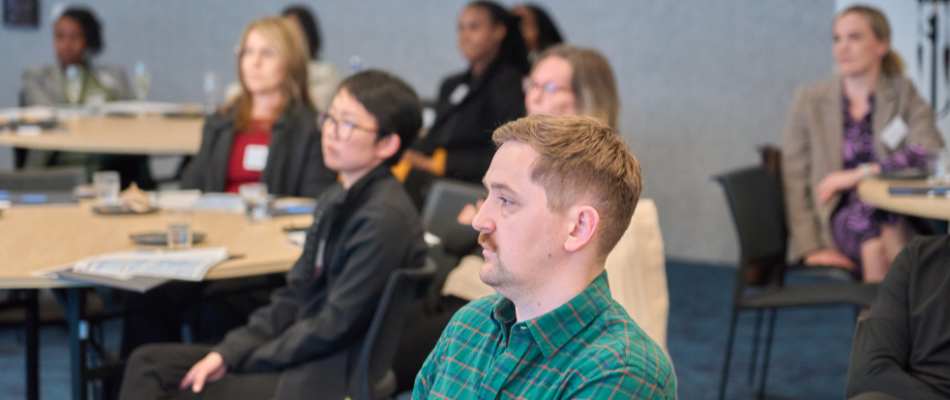 Event attendees looking at the presenter